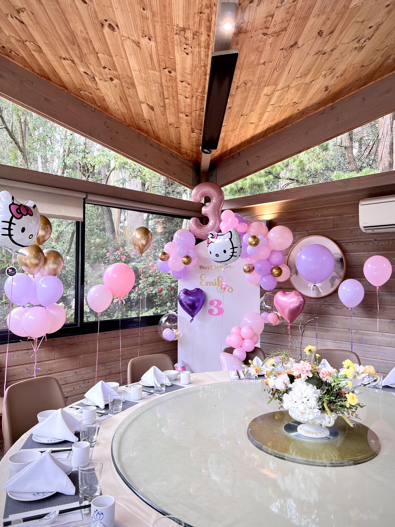 Hello Kitty themed 3rd birthday with pink and purple balloons