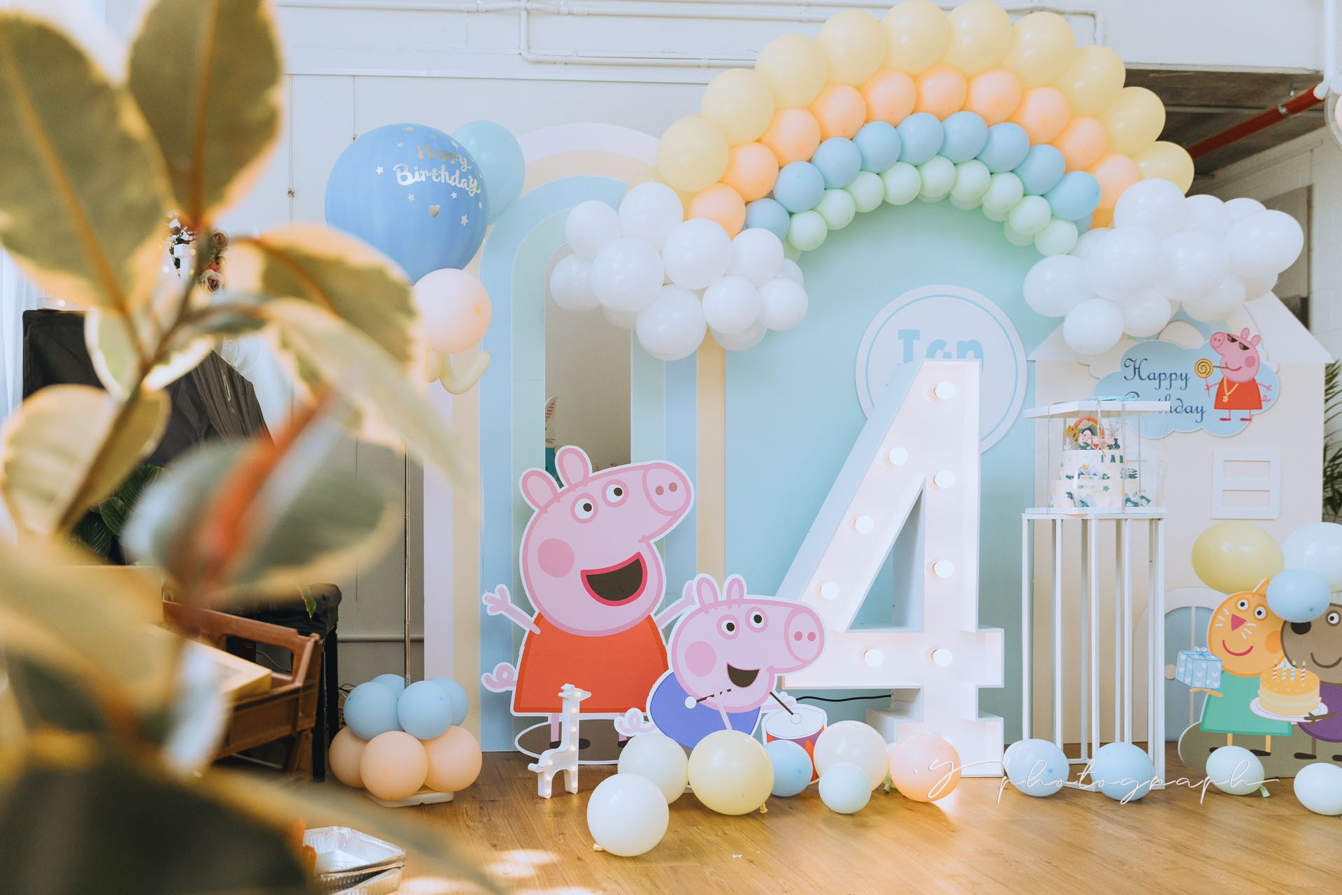 Peppa Pig themed 4th birthday with pastel rainbow balloon arch