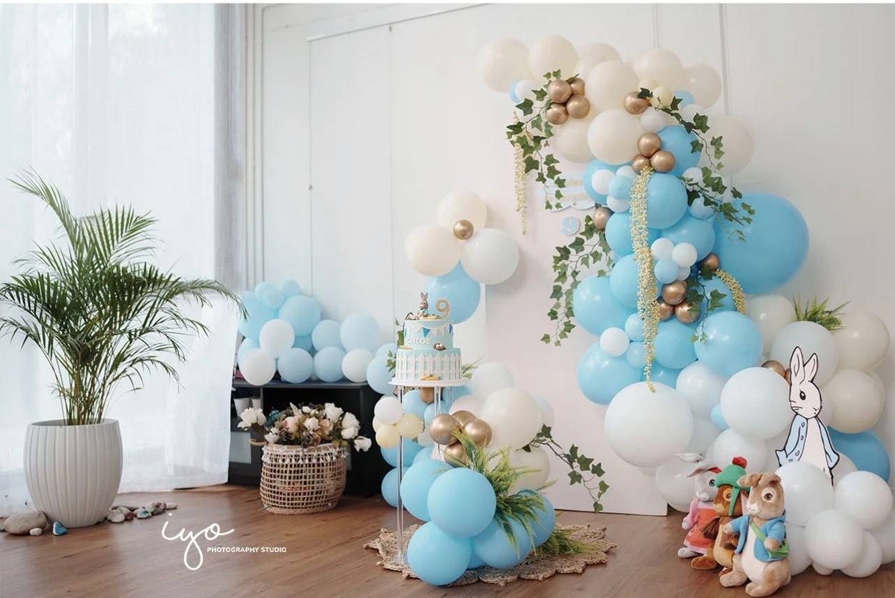 Sweet Peter Rabbit themed party with blue and white balloons