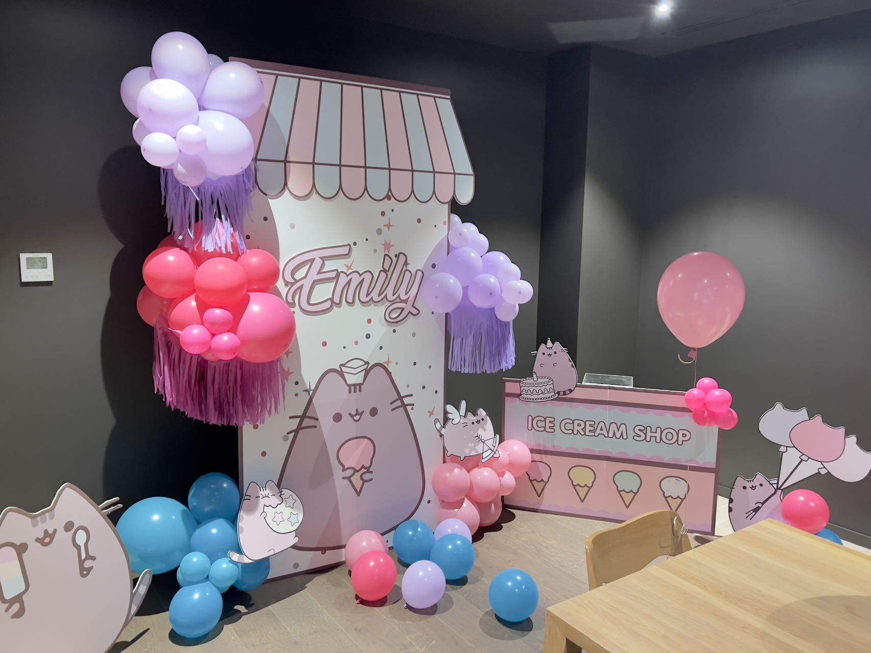 Pusheen cat ice cream shop themed party with pink and purple decorations